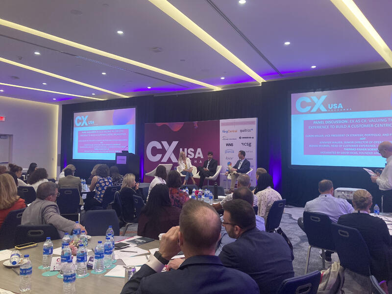 Rohan Sharma speaking at the CX Exchange panel discussion.